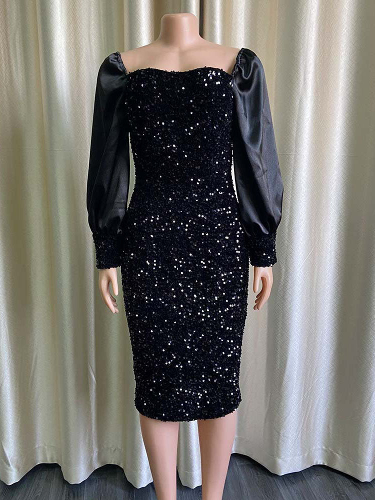 Mannequin displaying a black sequined midi dress with long puff sleeves and a square neckline.