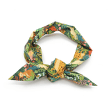 A green jungle print headband tied in a knot, viewed from the front.