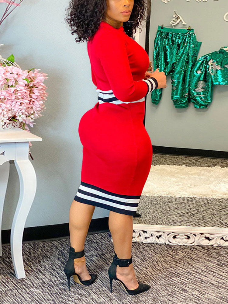 Back view of a woman in a red striped knit dress