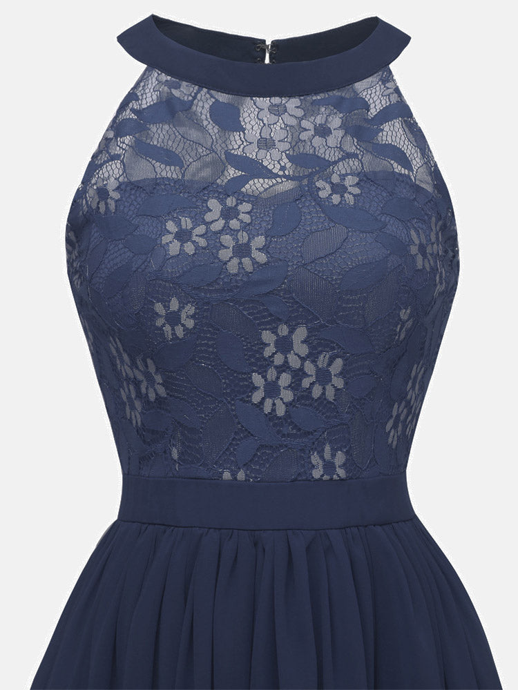 Close-up of the navy blue lace bodice with floral pattern