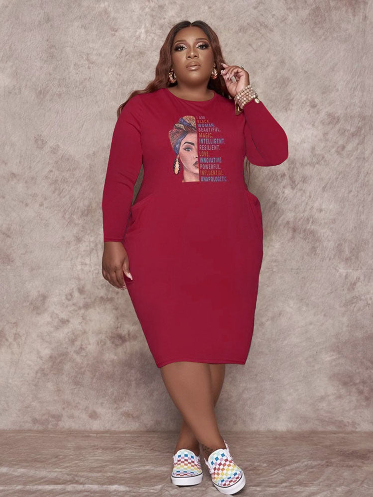 Woman wearing a red long sleeve sheath dress with graphic print and side pockets.
