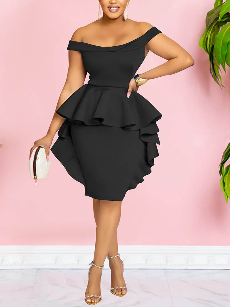 Woman wearing a black off-the-shoulder dress with ruffle details and an asymmetrical hemline, holding a clutch.