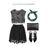 Outfit suggestion featuring a black and white patterned top, black lace skirt, black clutch, black studded heels, and a navy blue tropical print headband.