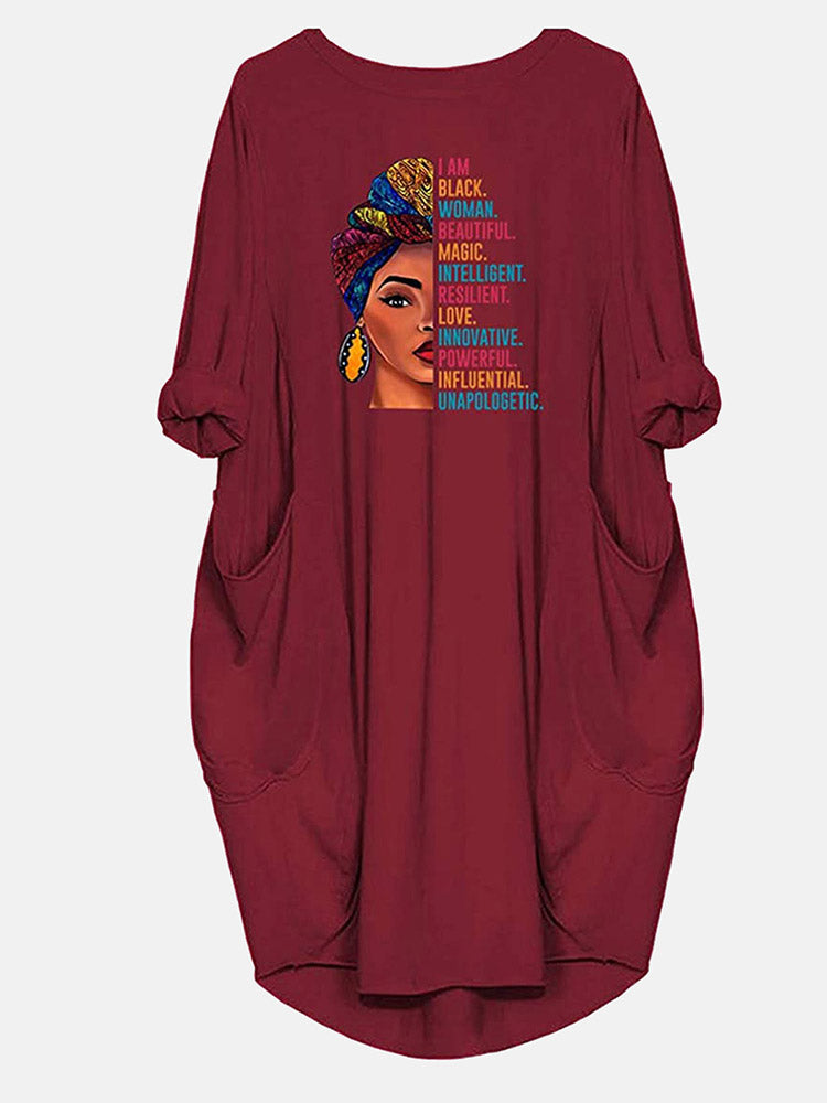 Maroon t-shirt dress with a graphic print of a woman and empowering text, showing the front of the garment.