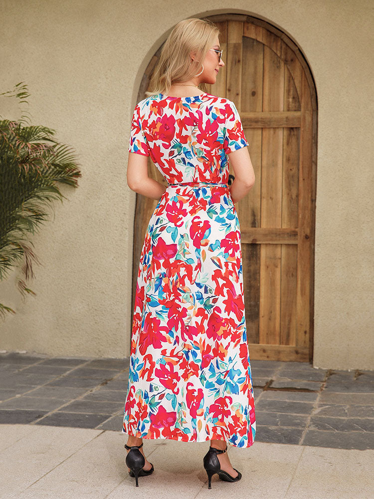 Back view of a woman in a floral print maxi dress.