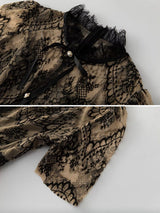 Close-up of the lace neckline and sleeve detail of the dress