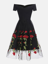 black off-the-shoulder midi dress with embroidered red roses and tulle skirt, front view