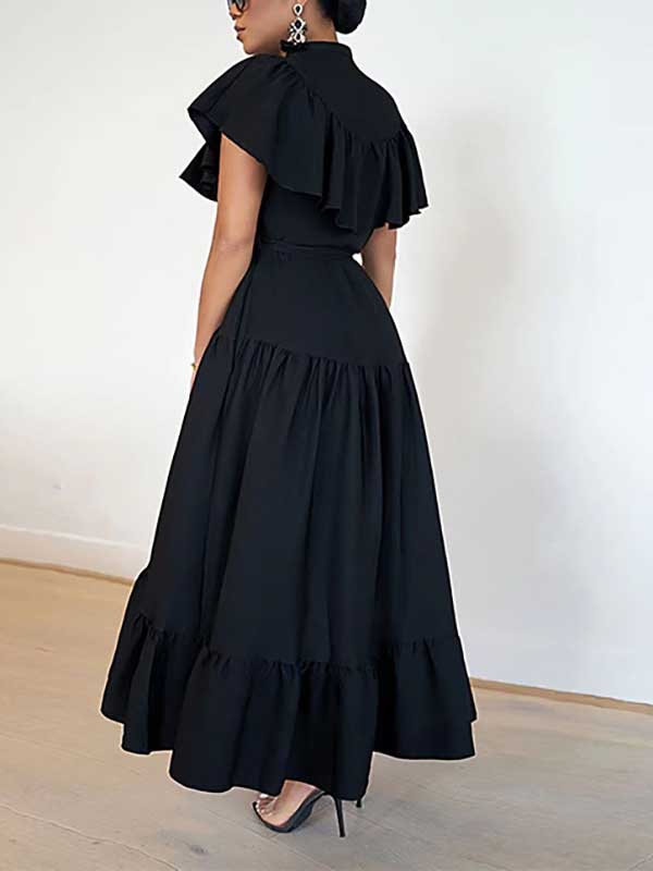 Back view of a woman wearing a black ruffled midi dress.