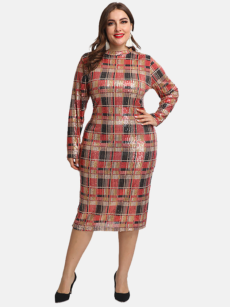 Woman wearing a sequined plaid pencil dress with long sleeves and a mock neck, standing against a white background.