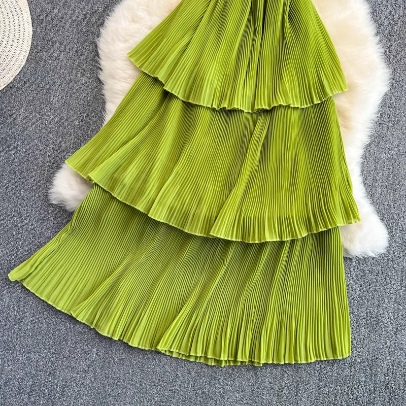 Close-up of green tiered ruffled skirt