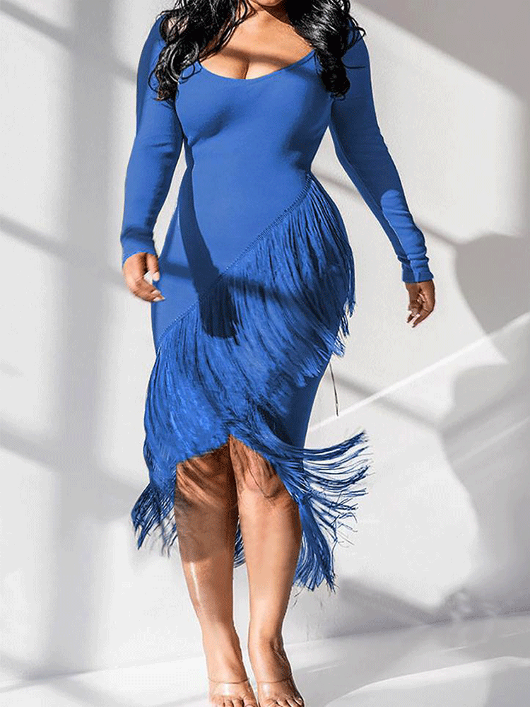 Woman wearing a blue long-sleeved midi dress with fringe detailing