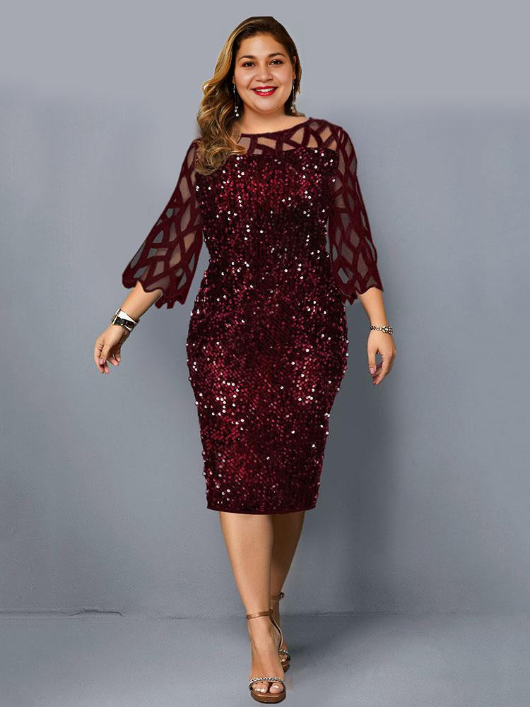 Woman wearing a burgundy sequined sheath dress with sheer geometric mesh bell sleeves