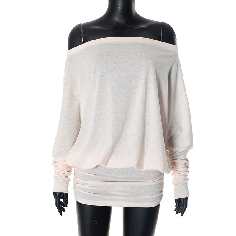 Light beige off-the-shoulder mini dress with ruched waist displayed on a mannequin.