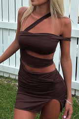 Brown one-shoulder dress with cut-out details and a high slit