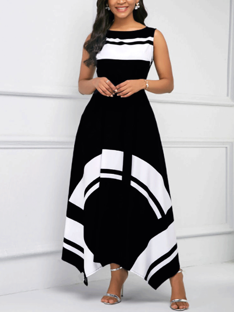 Woman wearing a black and white sleeveless A-line maxi dress with a scoop neck, tie waist, and asymmetrical hemline, front view