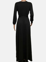 Back view of a black long-sleeve maxi wrap dress on a mannequin.
