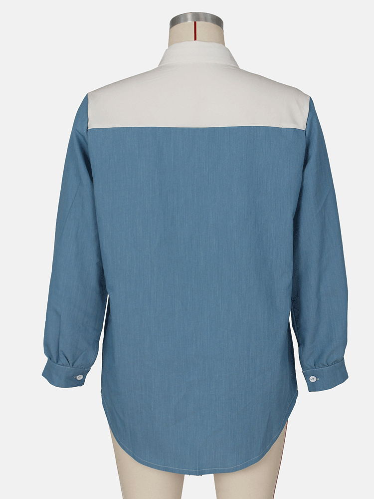 Back view of a colorblock shirt dress with appliqué patches displayed on a mannequin