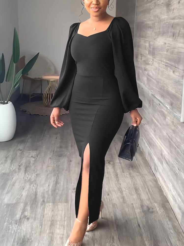 A woman in a black dress with a square neckline and dramatic puff sleeves, showcasing the garment's silhouette.