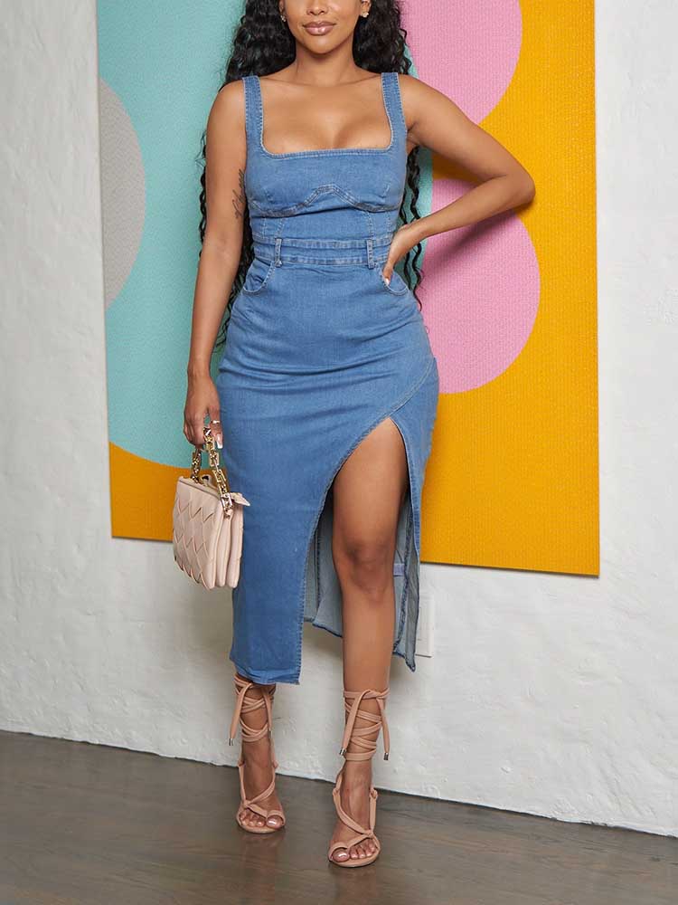 Woman wearing a blue denim midi dress with a square neckline and a high slit.