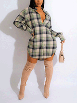 Woman wearing a green and black plaid shirt dress with thigh-high boots.