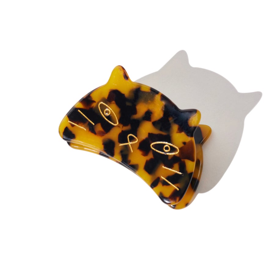 Tortoiseshell cat face hair claw clip with shadow