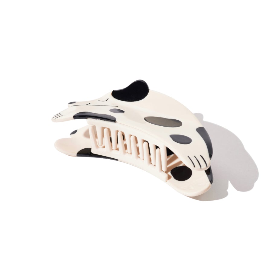 White and black cow print cat claw hair clip, open