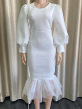 White puff sleeve dress on mannequin