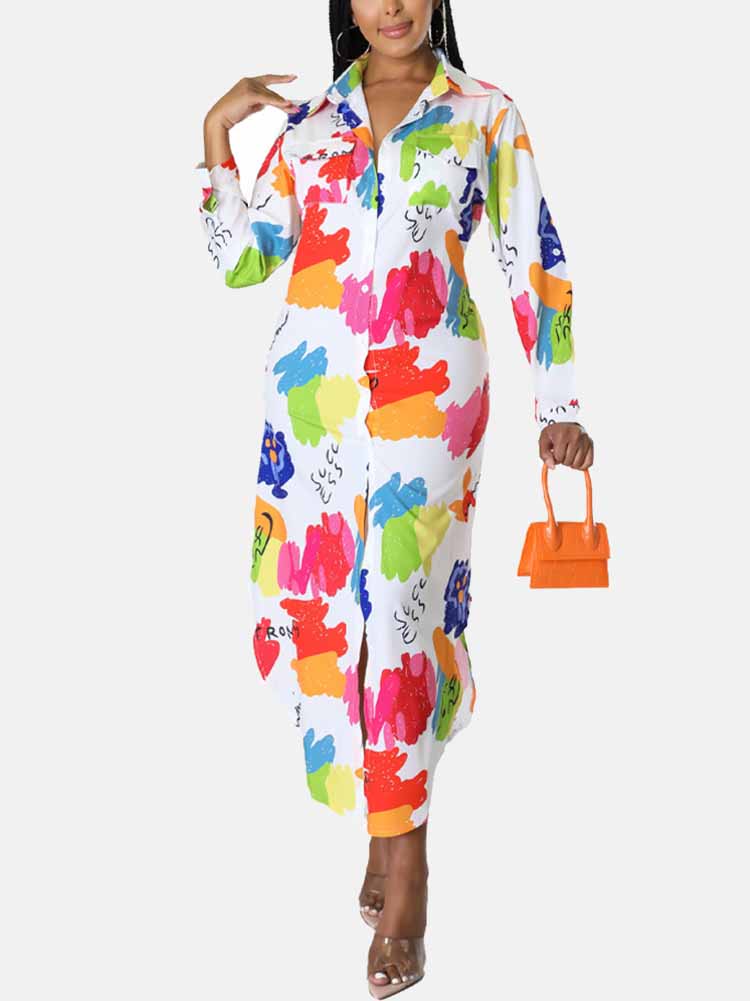 Woman in a white collared shirt dress with a vibrant abstract print. The dress has long sleeves, a button-down front, and a flowing maxi length. She is holding an orange mini handbag.