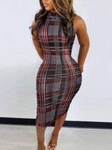 Woman wearing a sleeveless red, grey, and white plaid print bodycon midi dress