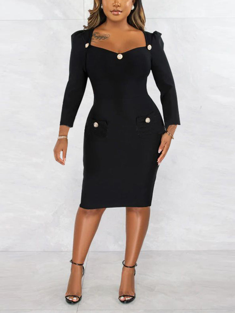 close-up of the neckline and bodice of a black dress