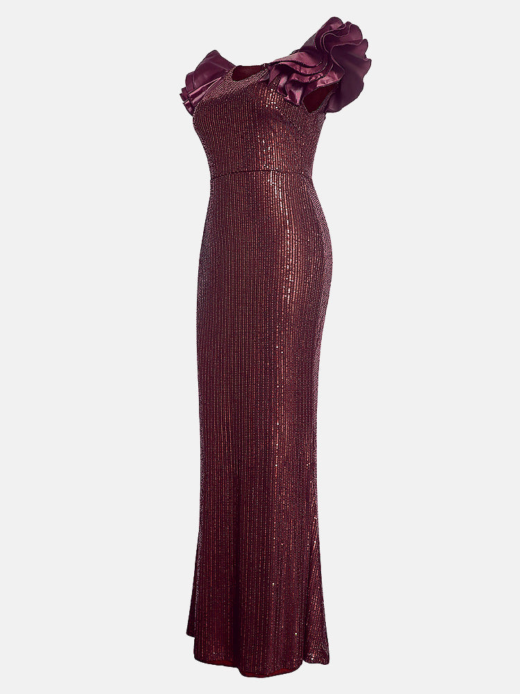Side view of a floor-length burgundy sequined mermaid dress with ruffled cap sleeves, displayed flat.