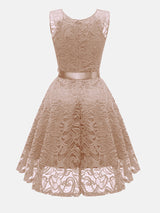 Back view of beige lace fit and flare dress with V-neck and satin ribbon