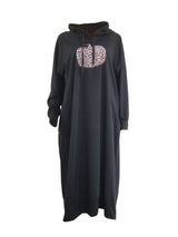 Black hooded midi dress with a pumpkin graphic print and leopard pattern, displayed flat.