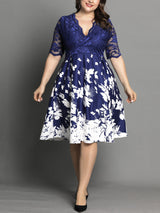 Plus size blue and white floral print fit and flare dress with lace top