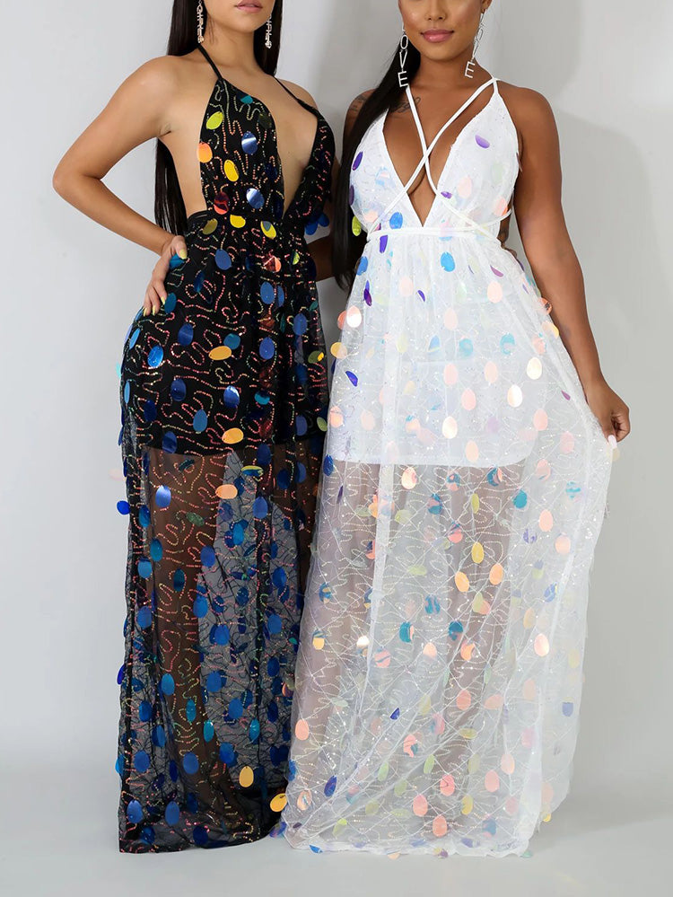 Two women posing, one in a black sequined maxi dress and the other in a white sequined maxi dress.