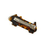 Back view of the tortoiseshell cat-shaped hair clip, showing the metal clip.