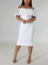 Woman in a white off-the-shoulder midi dress, front view.