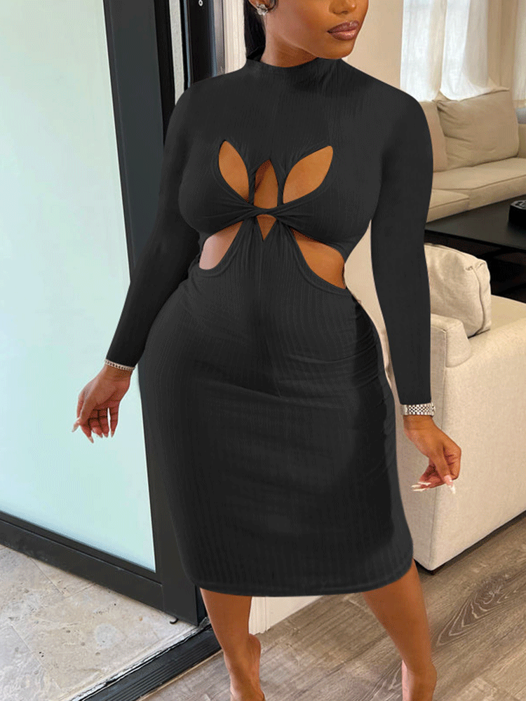 Close-up of a woman wearing a black ribbed knit midi dress featuring a mock neck, long sleeves, and cut-out design.
