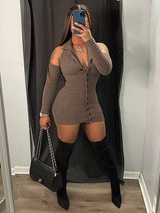 Woman wearing a brown ribbed knit mini dress with cut-out shoulders and a collared V-neckline, accessorized with black thigh-high boots and a black handbag.