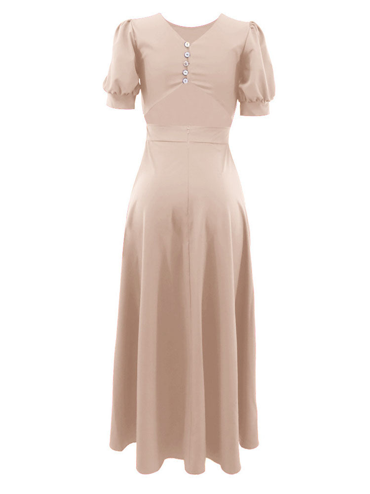 Beige A-line dress with puff sleeves and a round neckline, back view.