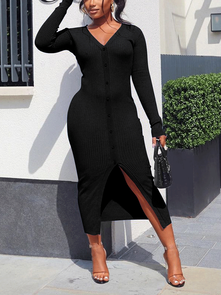 Woman posing in a black long-sleeve ribbed knit midi dress with a v-neck and front slit.