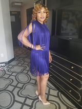 Woman in a purple fringed mini dress