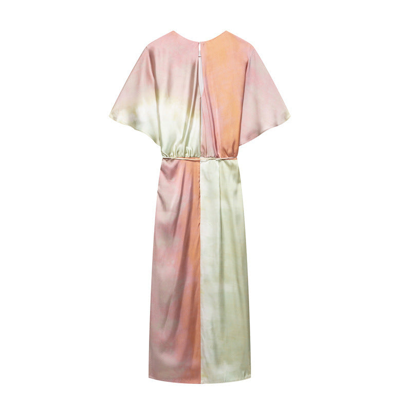 pink, yellow, and green ombre satin midi dress with batwing sleeves and a tie waist, shown back view