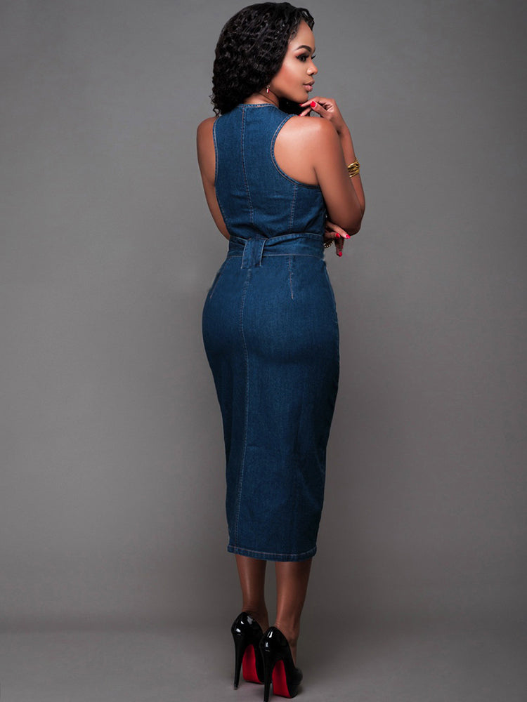 back view of a woman in a sleeveless denim sheath dress