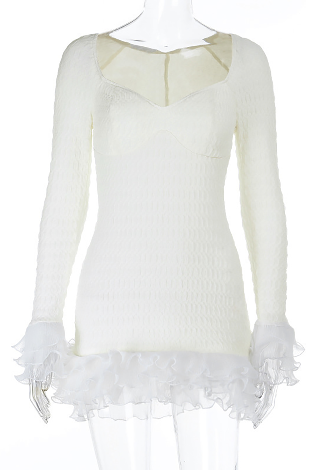 White textured mini dress with long sleeves and ruffled trim displayed on a mannequin.