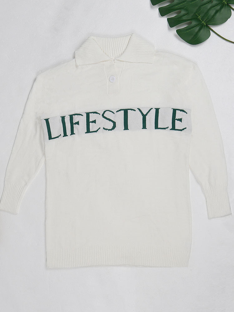White oversized knit sweater with a collared neckline, button closure, and green 'LIFESTYLE' text graphic