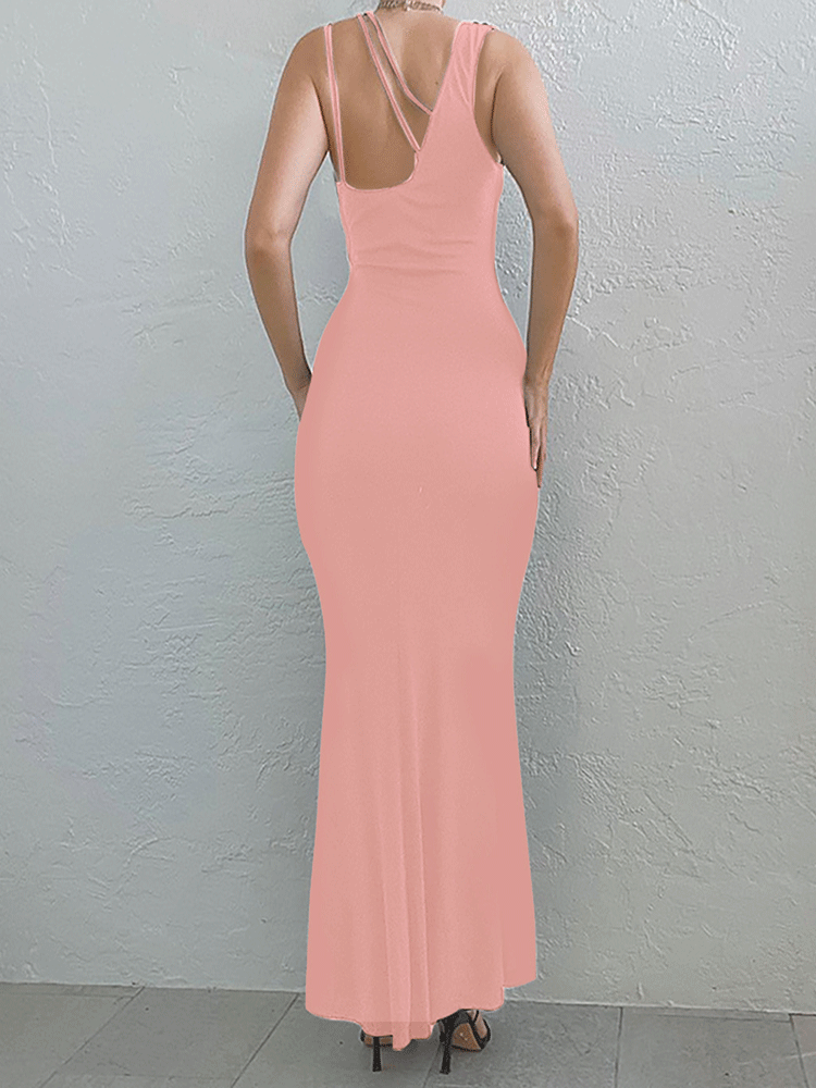 Back view of a woman in a light pink one-shoulder maxi dress