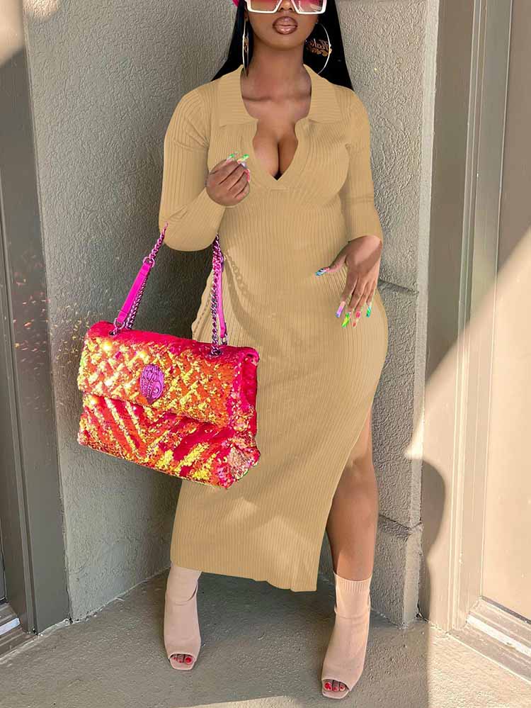 Woman wearing a tan ribbed knit midi dress with long sleeves and a v-neck collar, accessorized with a pink sequined handbag and tan heeled boots.