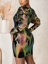 Back view of a woman in a sequined dress with puff sleeves.