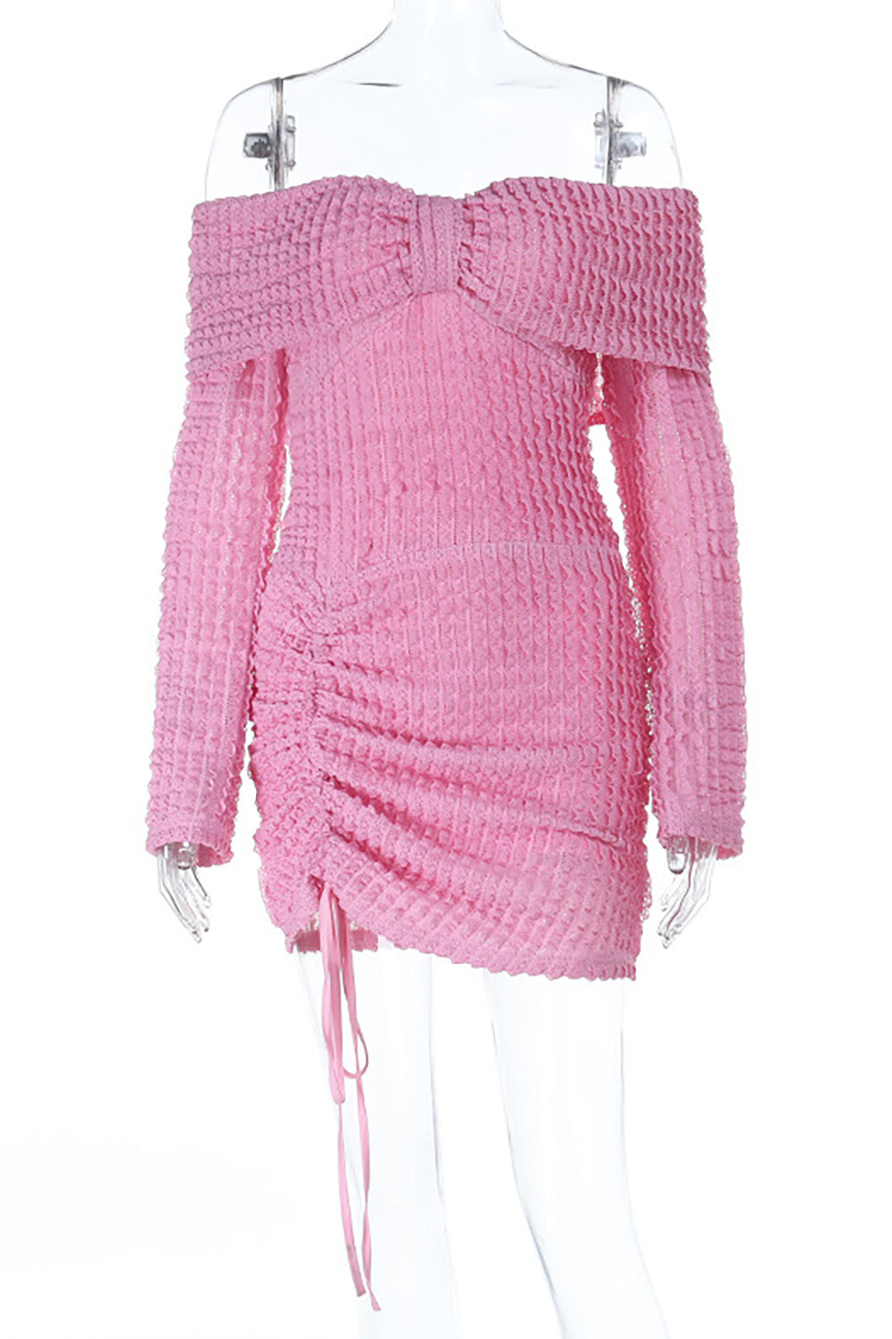 A pink off-the-shoulder ruched knit mini dress with long sleeves displayed on a mannequin.